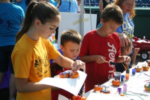 Pumpkin decorating at the resource fair.