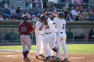 Jesus Aguilar getting congratulated after a home run